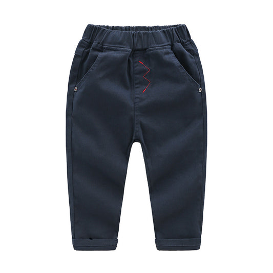 Navy blue children's pants with a red design on a white background