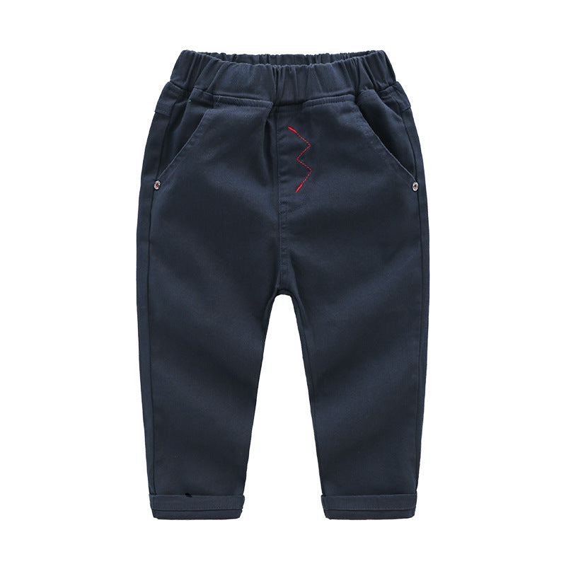 Navy blue children's pants with a red design on a white background
