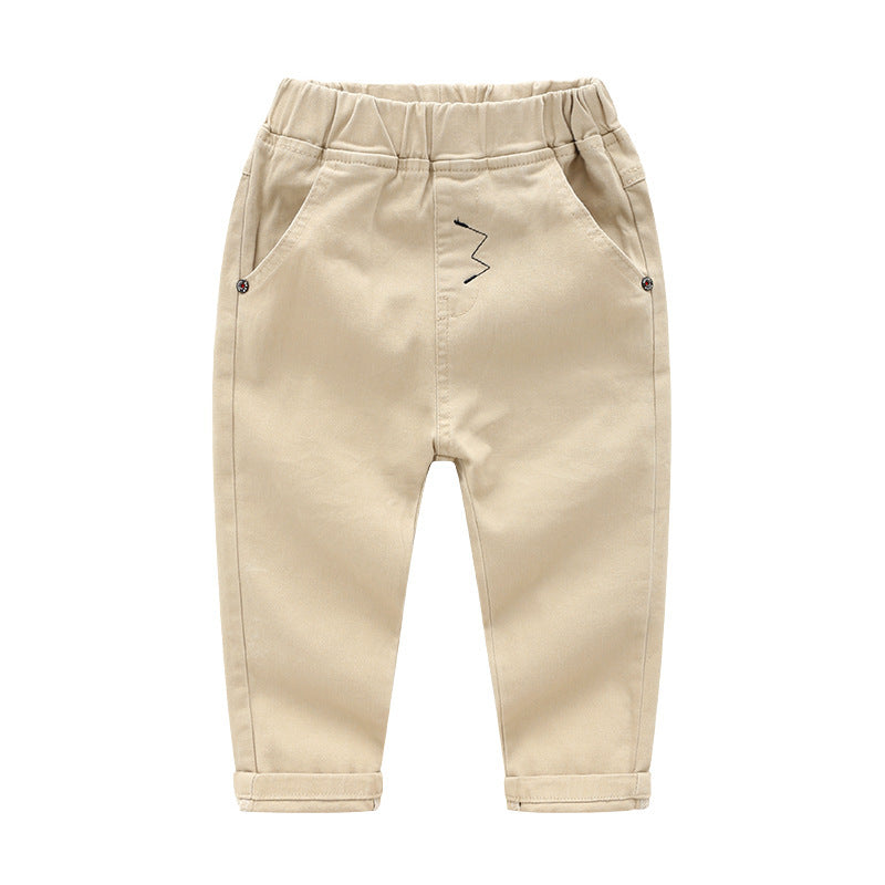 Beige children's pants on a white background