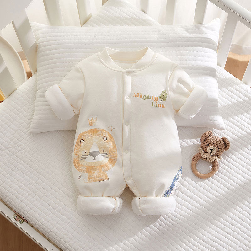 Baby onesie with lion design and rattle on a crib louna Kids